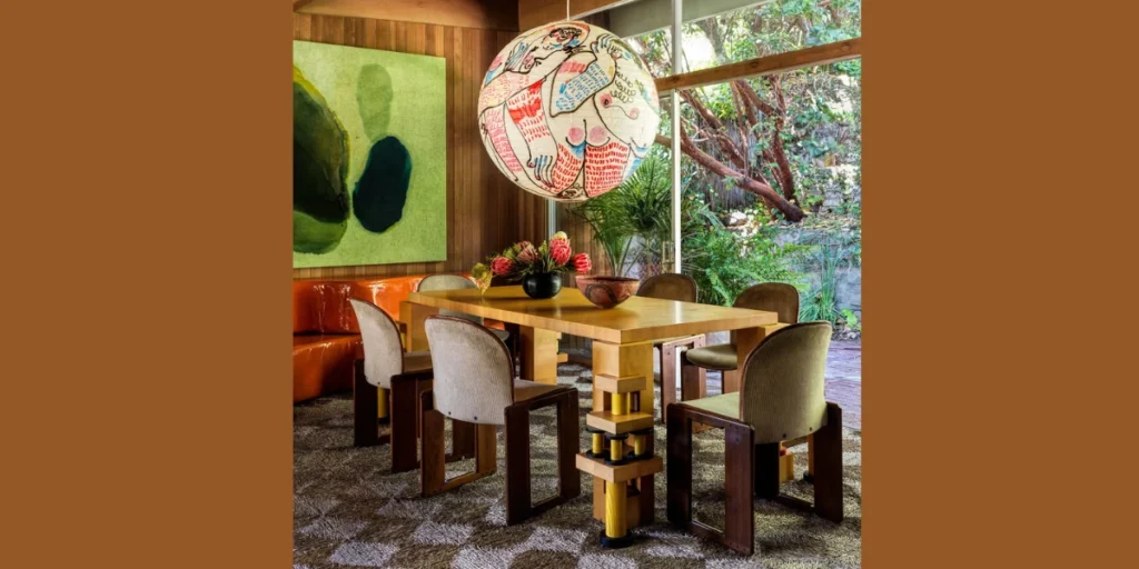 Eclectic Dining Room With Bold Wall Art