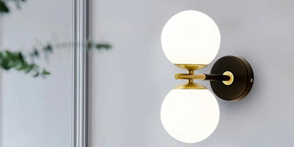 Glass Globe Bathroom Sconce for Balanced Light