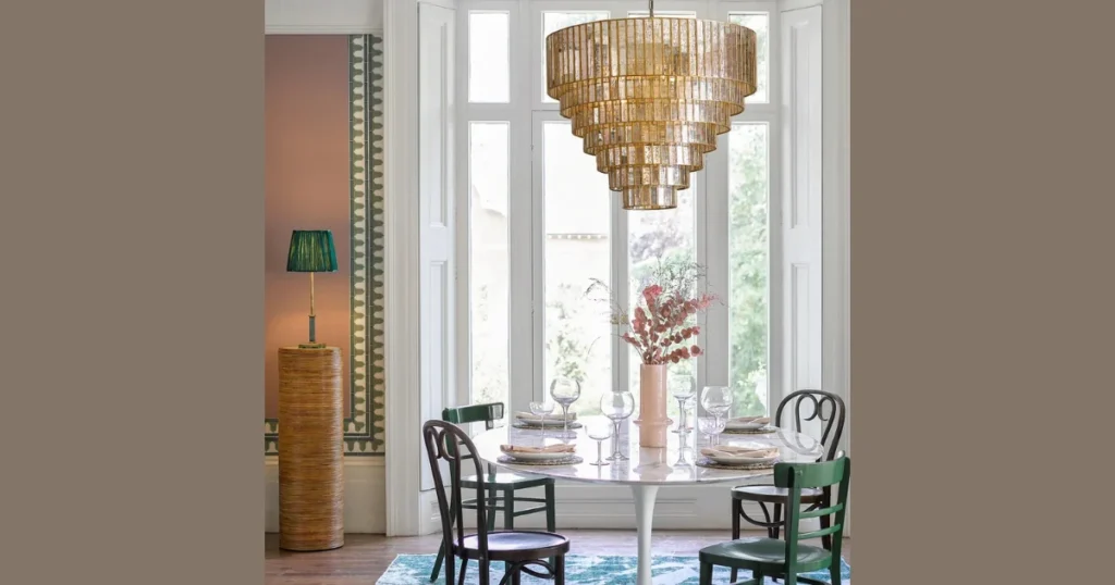 High Ceiling Elegant Dining Room with Large Statement Chandelier