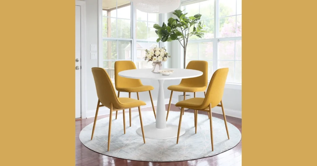 Round Dining Table with Different Colored Chairs