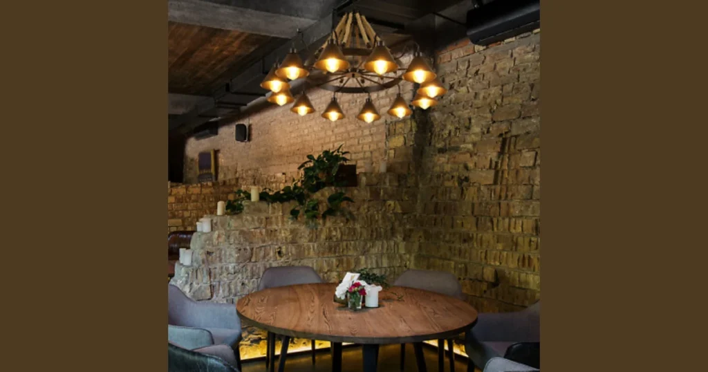 Farmhouse Wood and Iron Chandelier for Rustic Dining Rooms