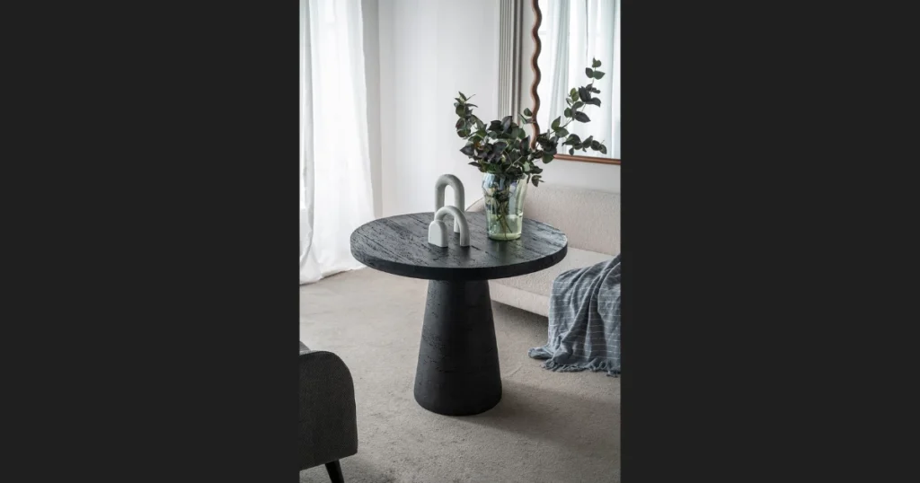 Black Pedestal Base Dining Table for Minimalist Interiors