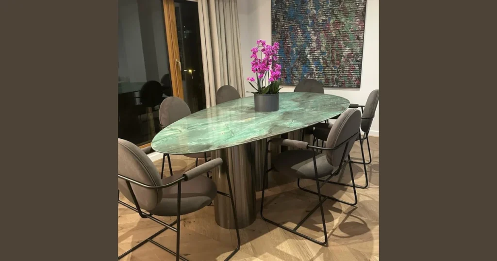 Oval Marble Dining Table for a Soft and Elegant Layout
