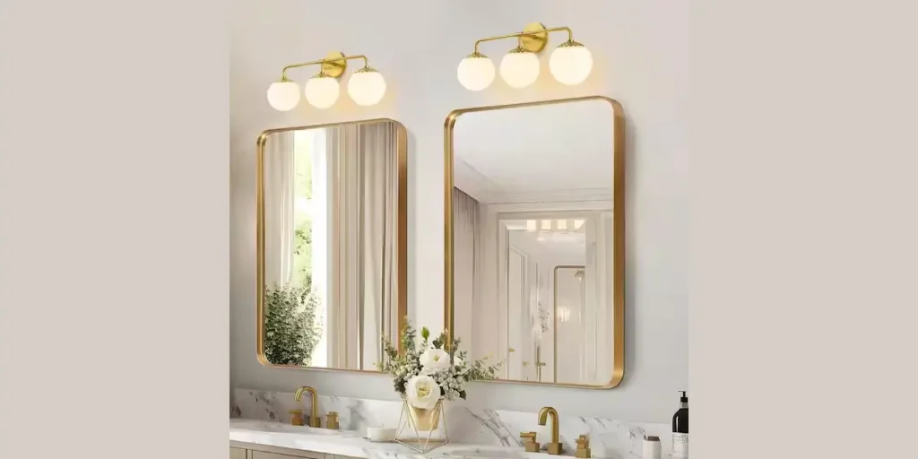 Wall Sconces Positioned Above the Mirror