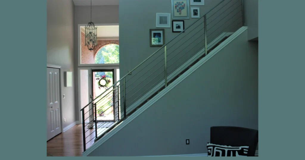 Glass Stair Railing with Metal Cable Accent