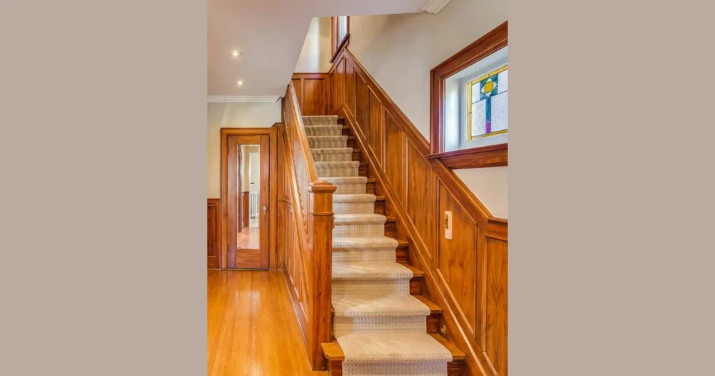Shiplap Half Wall with Wooden Handrail