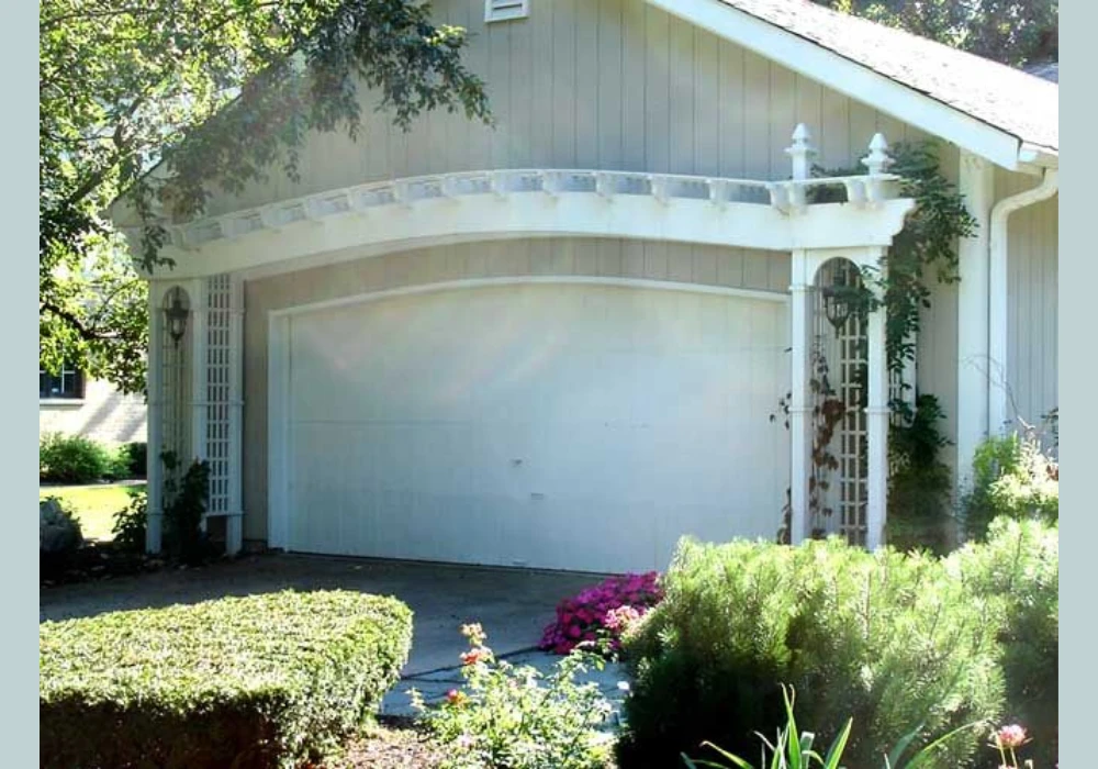 Arched Trellis Over Garage Door Ideas for Soft Architectural Look