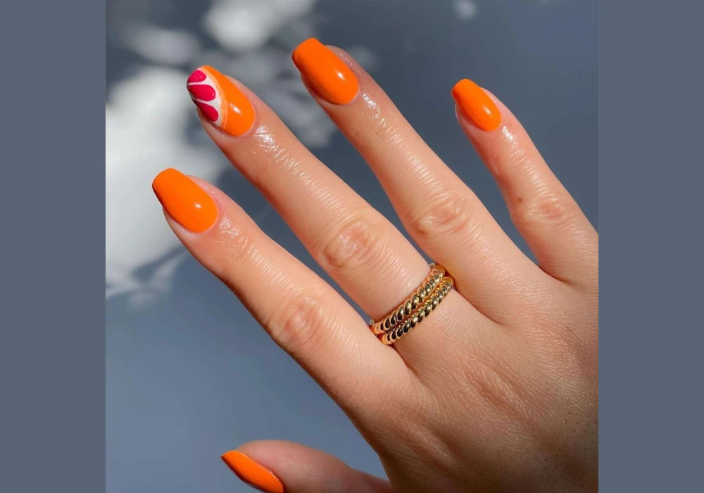 Bright Coral Nail Color for a Fresh Summer Look