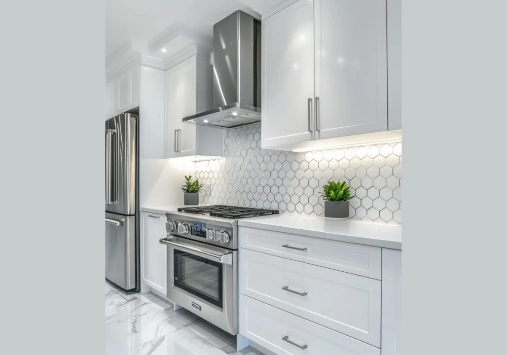 White Kitchen with Stainless Steel Appliances