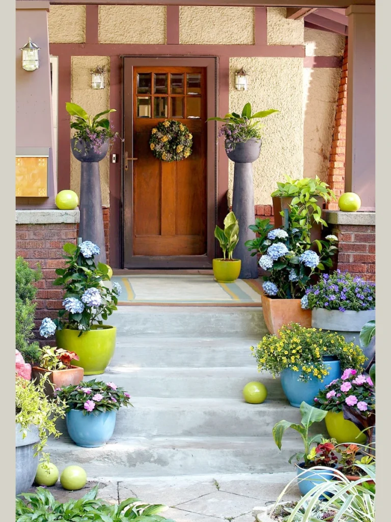 Dramatic Entrance Staircase Decor with Potted Displays