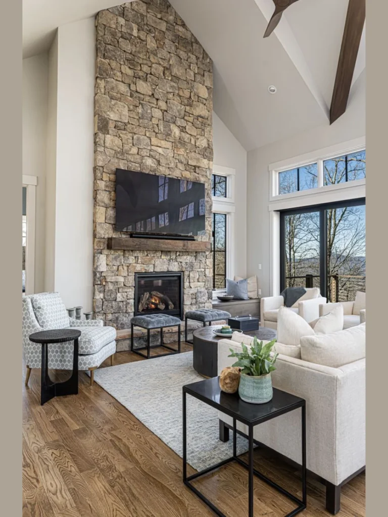 Floor To Ceiling Stone Living Room Walls