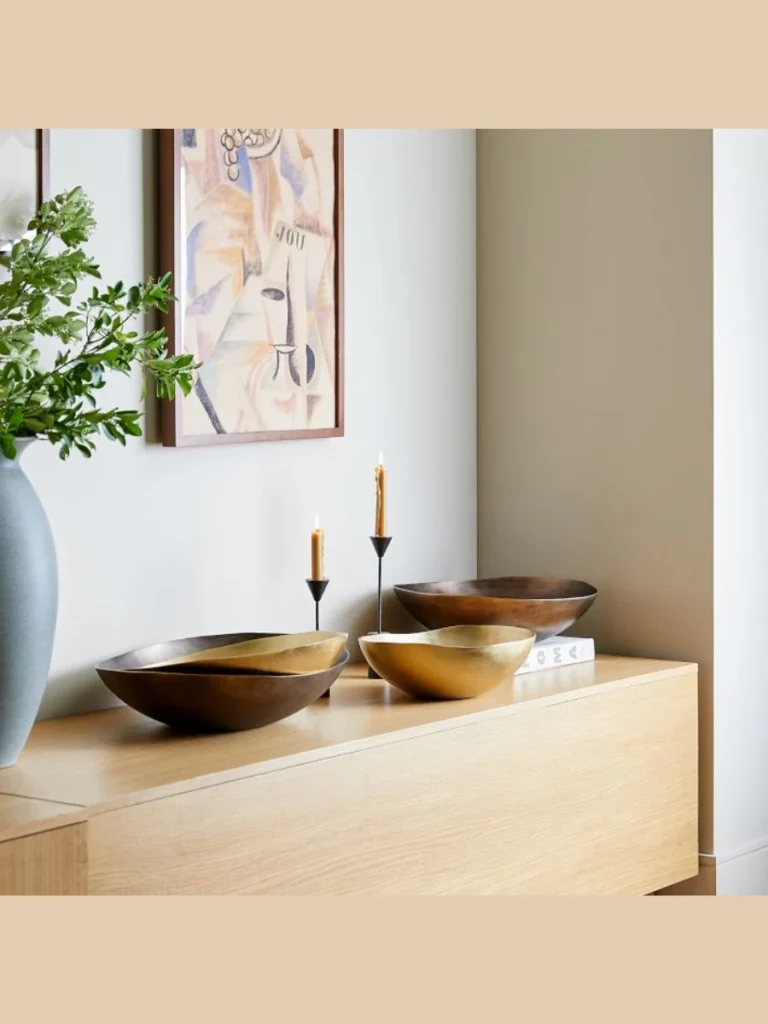 Hammered Metal Bowls Decorate Open Shelves