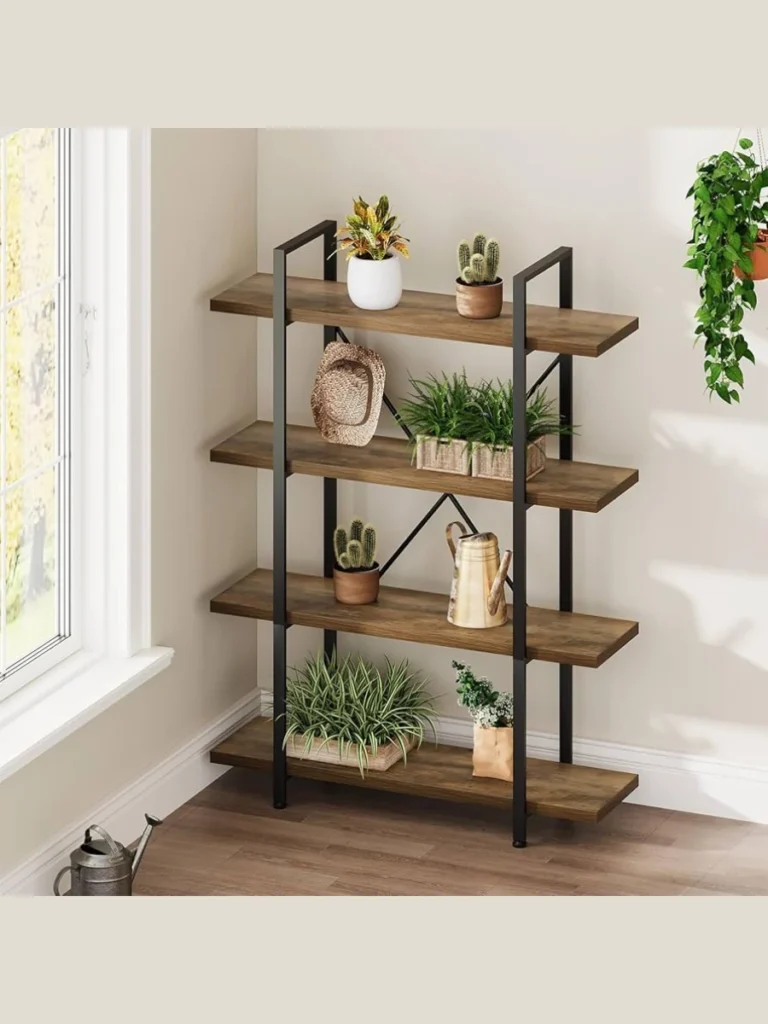 Industrial Metal Bookcases With Layered Art And Greenery