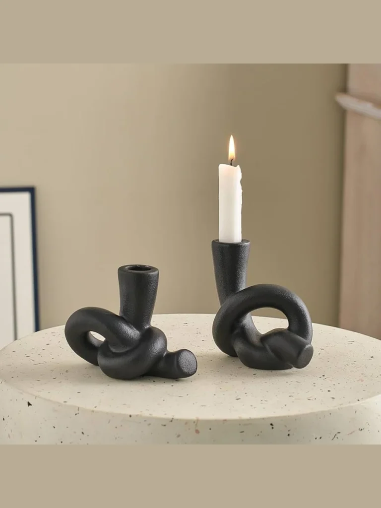 Matte Black Candleholders Provide Room Structure