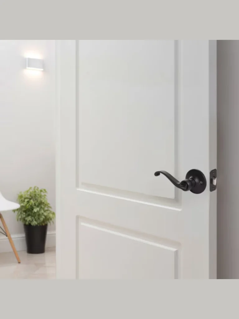 Matte Black Privacy Levers on White Shaker Doors