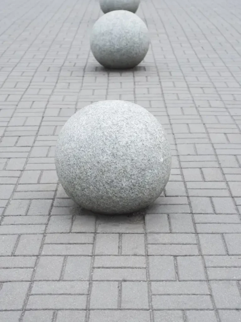 Rough Pitted Gray Concrete Spheres