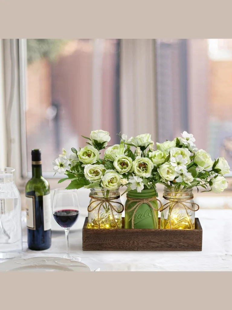 Cluster Three Small Clear Glass Mason Jars Filled with Fresh Green Mint Leaves
