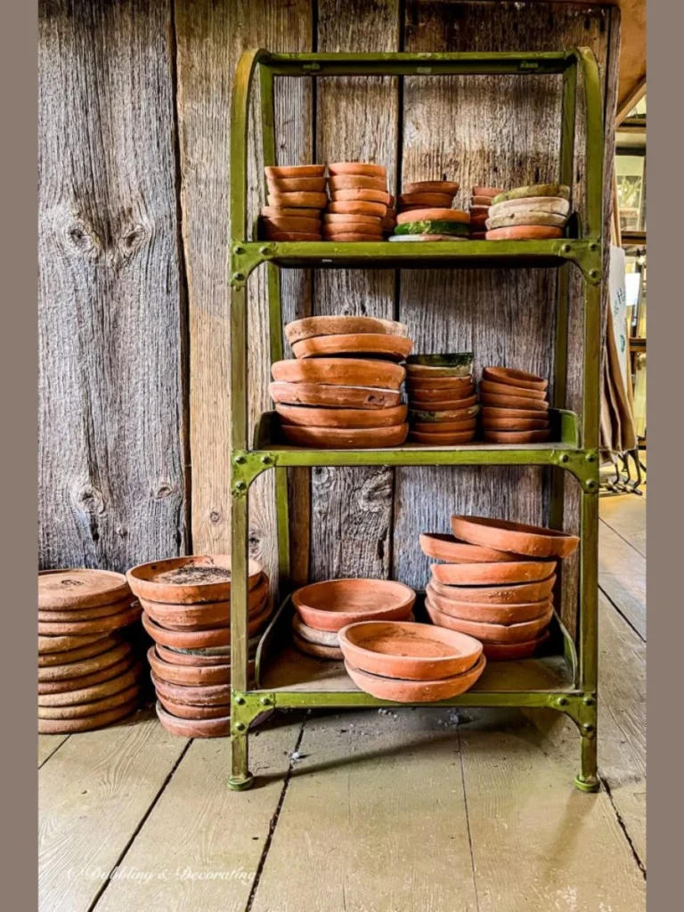 Combine Warm Terracotta Clay Pots with Woven Seagrass Baskets on Lower Levels