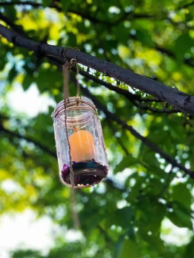 Convert Clear Glass Mason Jars into Hanging Wire Wrapped Lanterns for Tree Branches