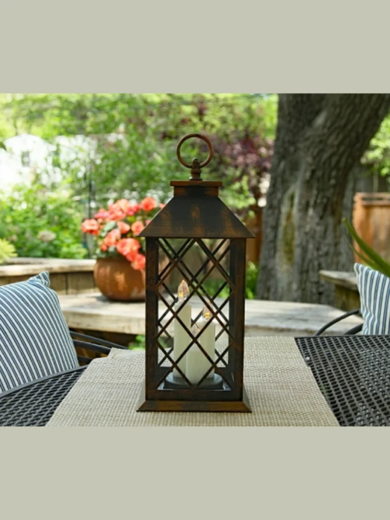 Drop a Long Battery Operated LED Pillar Candle Inside an Old Vintage Birdcage Enclosure