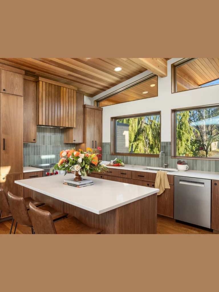 Floor to Ceiling Walnut Towers Framing Steel Ranges