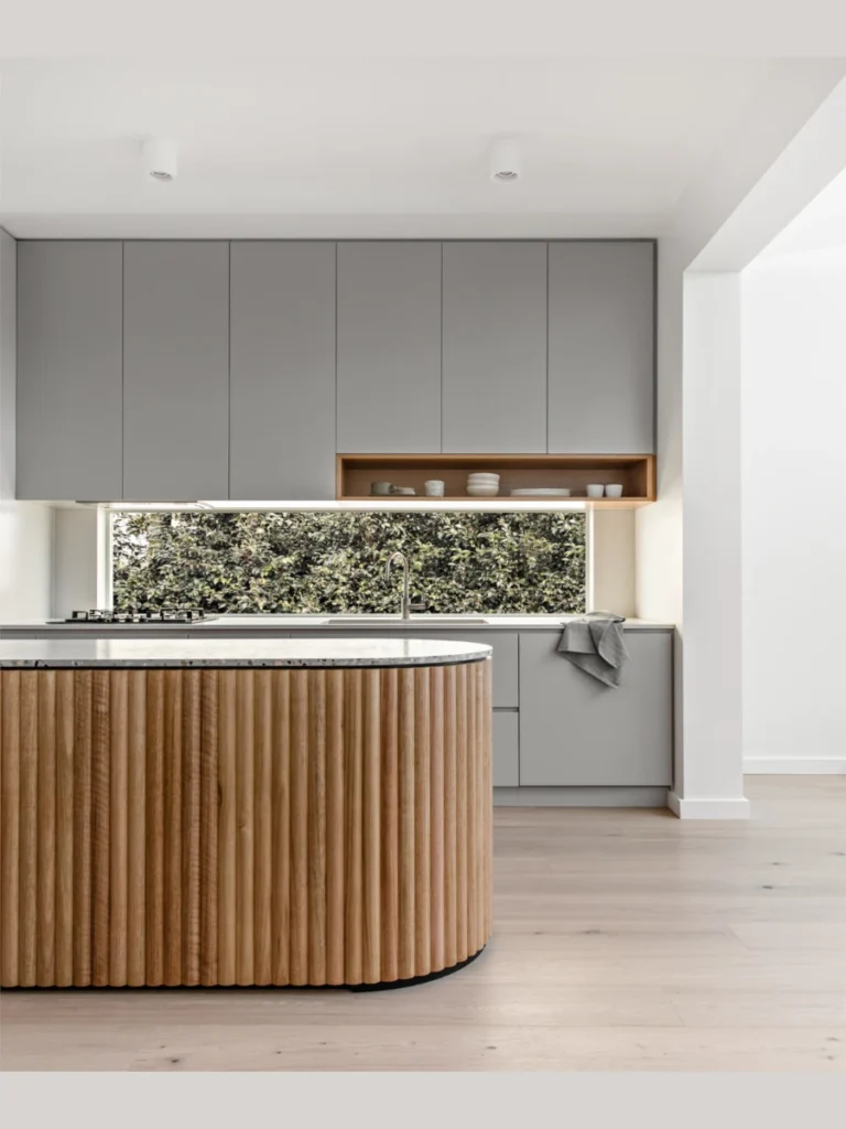 Fluted White Oak Island Bases Wrapped in Steel Worktops