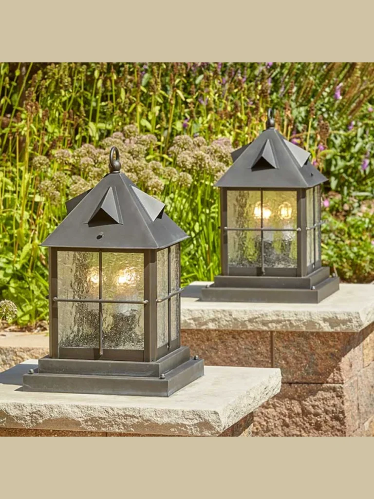 Frame Your Patio Lantern Base Plates with a Loose Ring of Real Polished River Stones