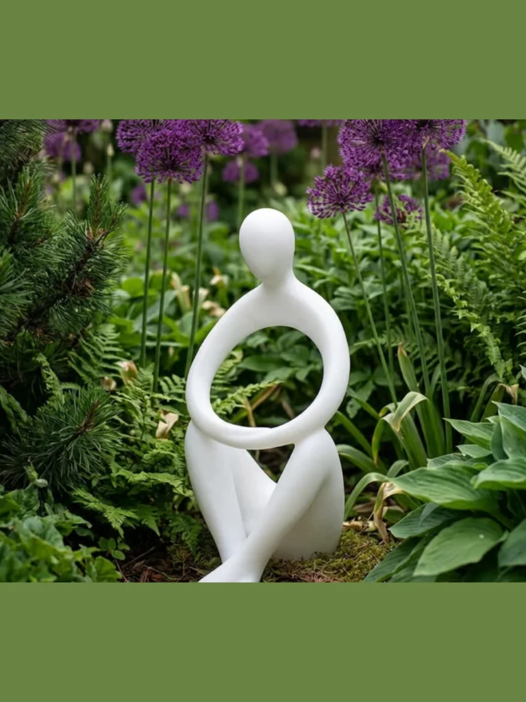 Group Matte White Geometric Statues in Landscaping Borders