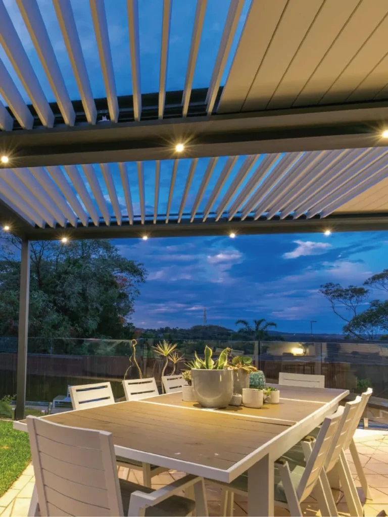 Mount Sleek Brass Downlight Spotlights Along the Upper Perimeter Beams