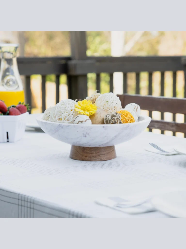Place a Solid White Marble Accent Stool to Hold Fruit Water Pitchers