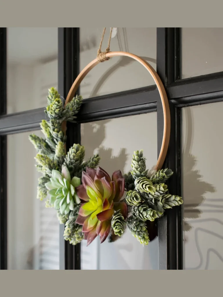 Position Colorful Realistic Artificial Succulents Inside a Smooth Wooden Embroidery Hoop