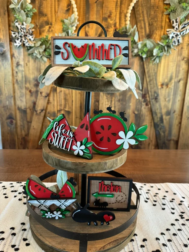 Position Faux Plastic Watermelon Wedges and Small Black Chalkboard Signs for Barbecues