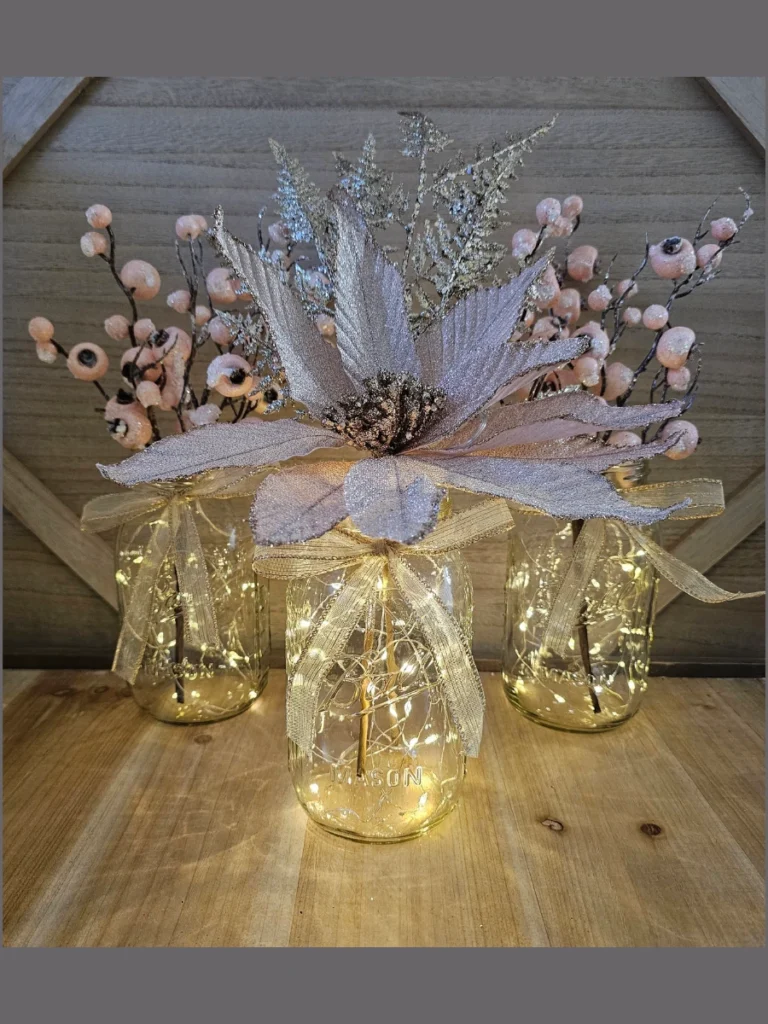 Position Three Clear Glass Mason Jars Filled with White Star Pip Berries Along a Bench