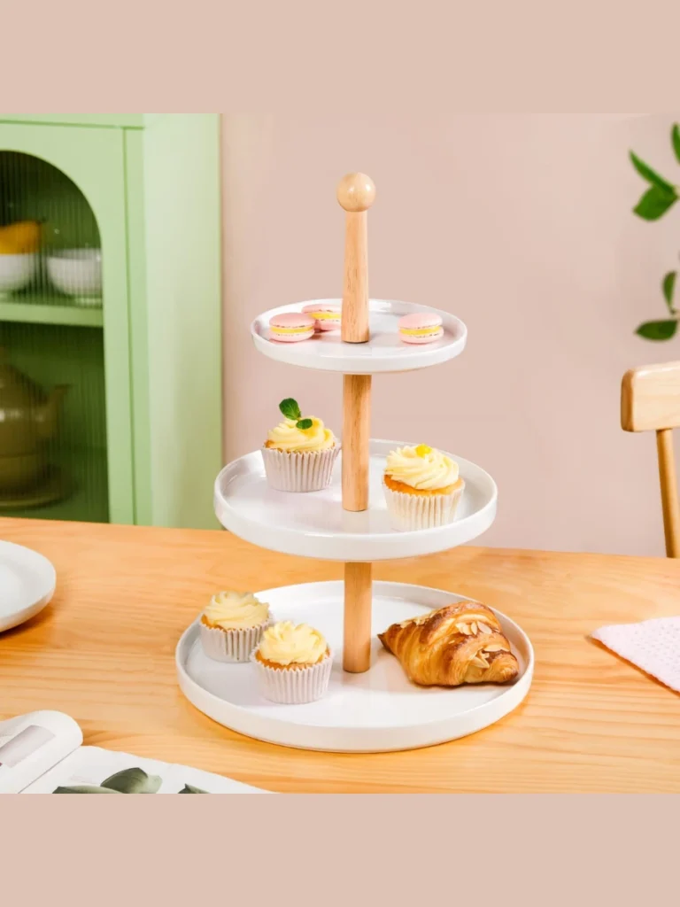 Position a Miniature White Ceramic Cupcake Stand Holding a Faux Lime Slice Up Top