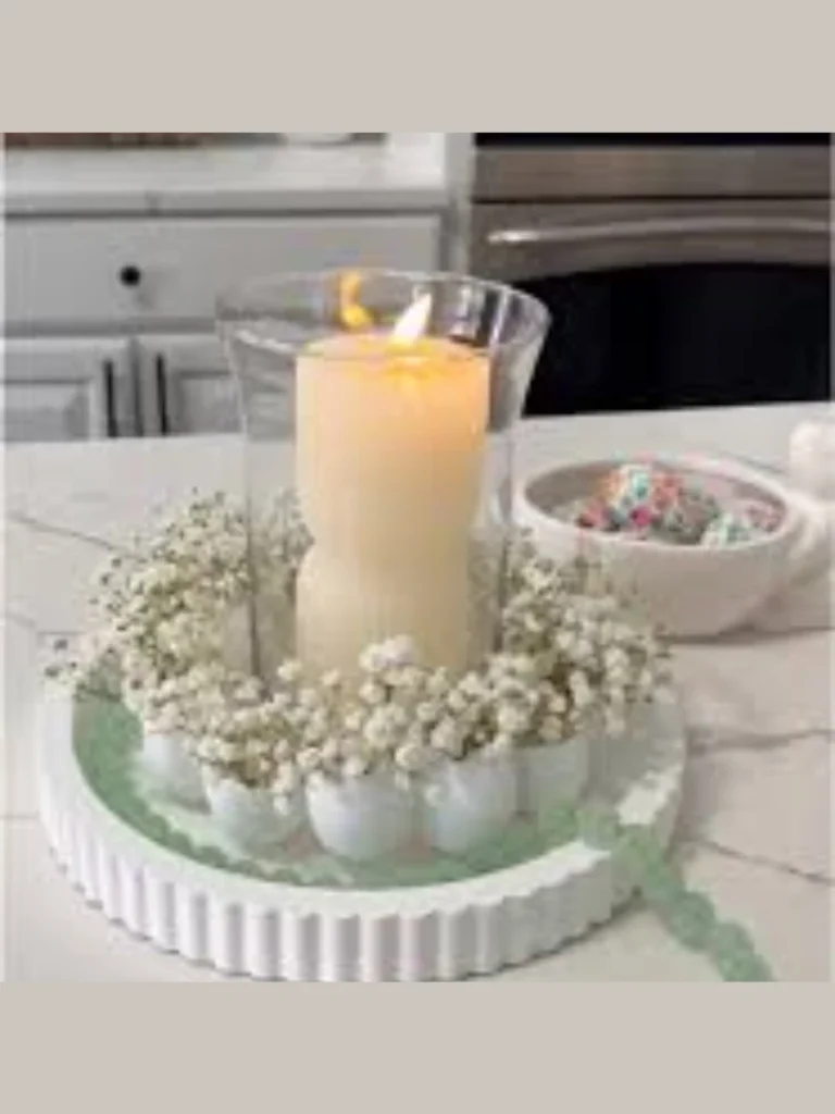 Position a Miniature White Ceramic Cupcake Stand Holding a Glass Votive Lantern Up Top