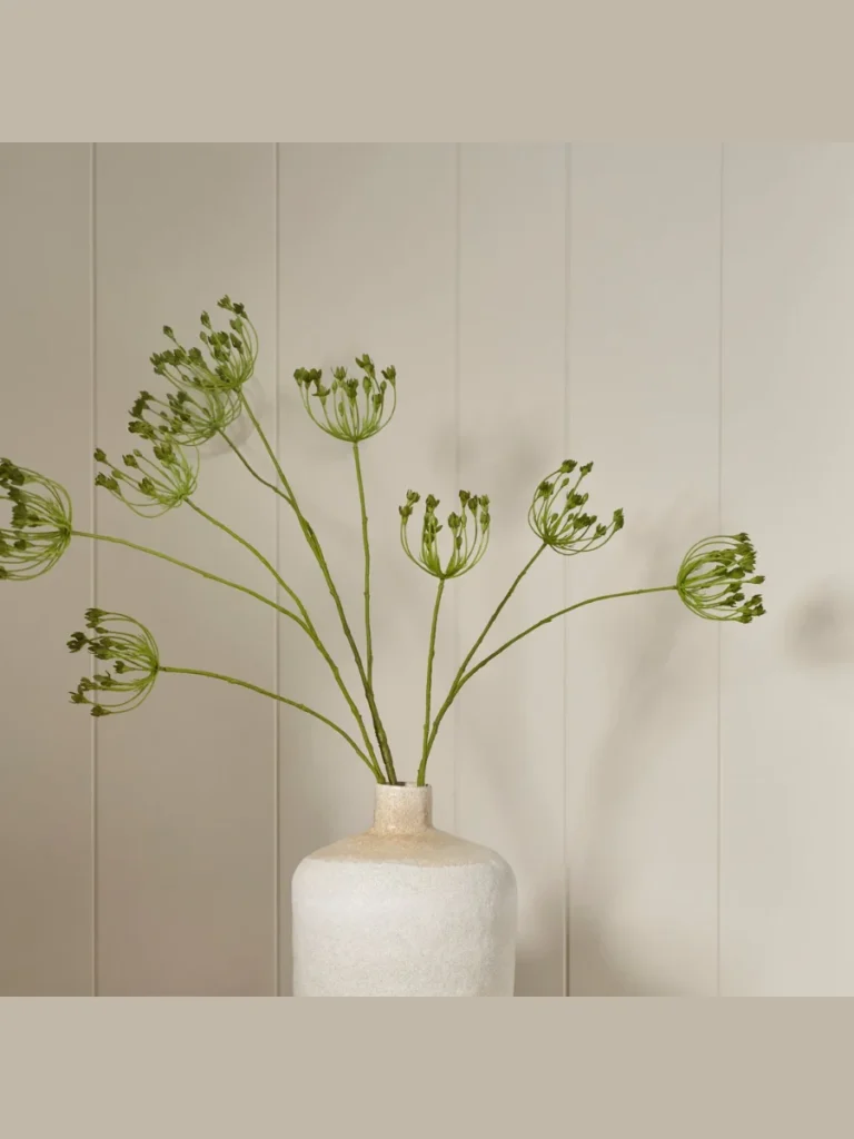 Twist Fluffy White Queen Anne's Lace Clusters Inside an Old Green Glass Wine Bottle