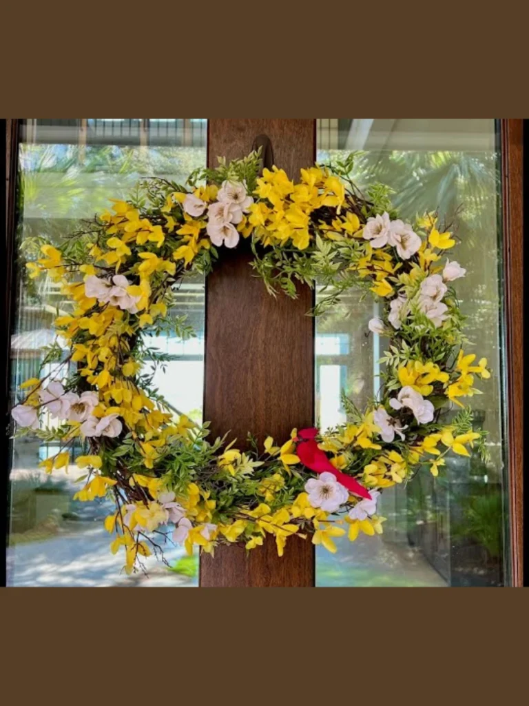 Twist Long Strands of Artificial Yellow Forsythia Blossoms Across a Slatted Grapevine Frame