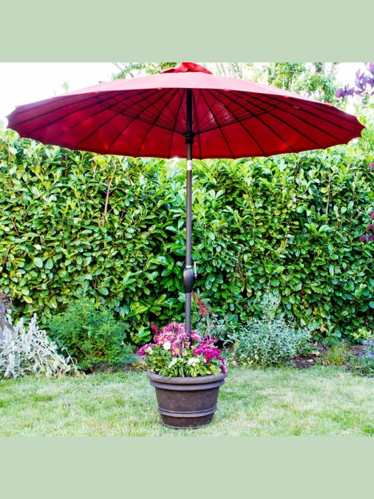 Use an Oversized Terracotta Water Pitcher as a Unique Umbrella Stand
