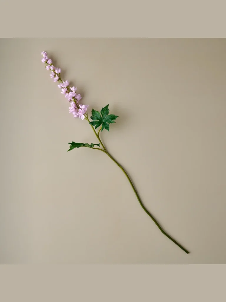 Weave Branching Purple Larkspur Stems Inside a Tall White Ironstone Pitcher