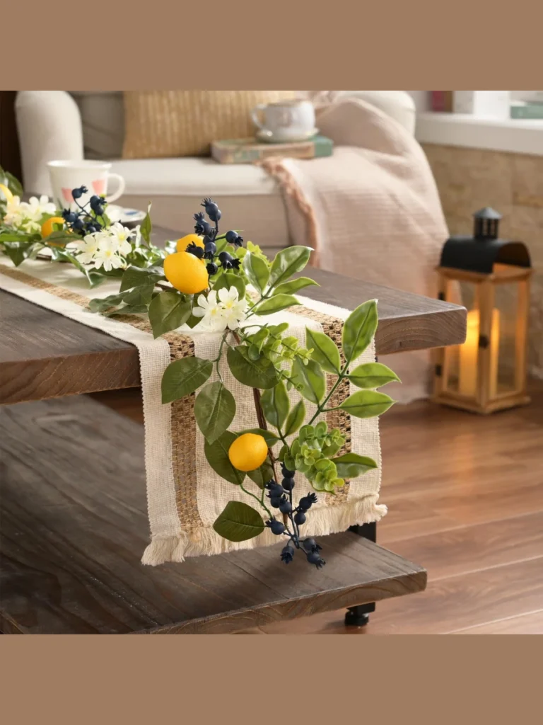 Weave a Full Strand of Faux Lemon Leaf Garland Across a White Wooden Bead Strand